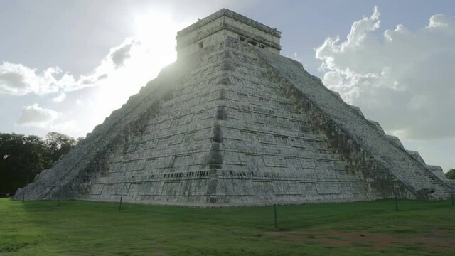 establishing shot of chichen itza castillo temple at sunrise no people