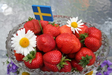 Swedish Midsummer dessert - strawberries - with Swedish flag on top - obrazy, fototapety, plakaty