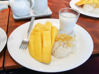 Mango sticky rice dessert is famous in Thailand.