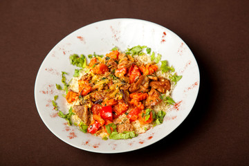 meat with vegetables and side dish in Georgian