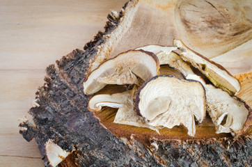 Dried porcini mushrooms on a wooden table. Rustic style. Harvest.