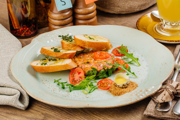 Steak tartare (Raw beef) - classic steak tartare on plate