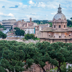 View of Coliseum, Church of Santi Luca e Martina and Roman Forum in Rome, Italy