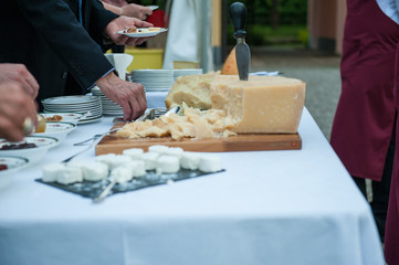 particular of grana cheese during a wedding party