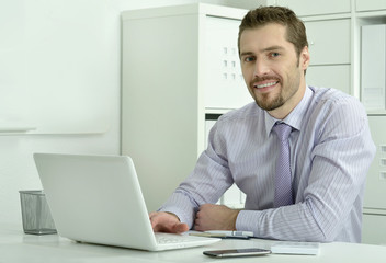 businessman working with laptop in office