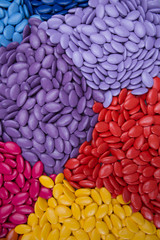 Colorful dragee candies on a white background