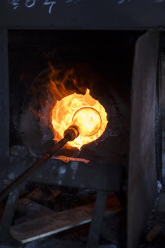Glass heated in a furnace in a glass factory