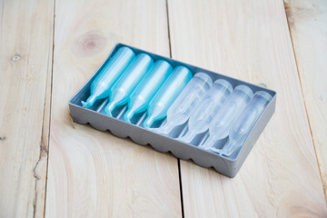 vitamin or medicine on wood pallet background