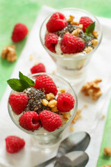 Yogurt with chia seeds, walnuts and raspberries