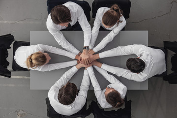 Business people joining hands