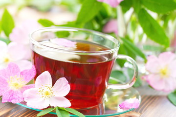 Cup of tea and dogrose