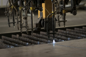 Metal cutting with acetylene torch close-up