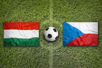 Hungary vs. Czech Republic flags on soccer field