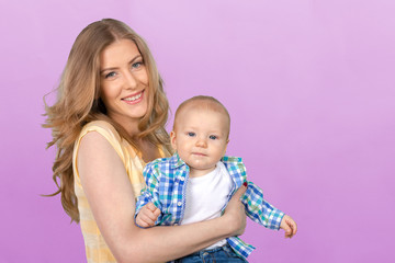 Happy young mother and her son