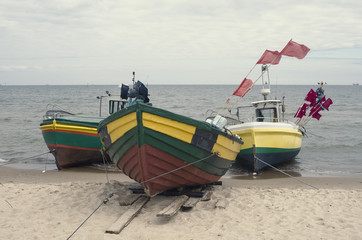 Fishing boat on the sea shore