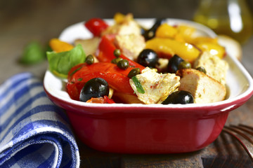 Chicken fillet stewed with bell pepper and capers.