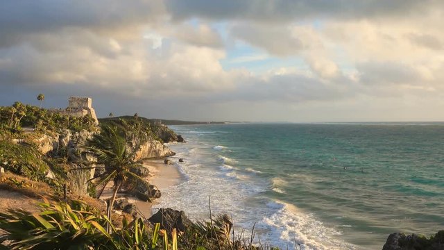 mayan site of tulum at sunrise,temple lying on the sea no people