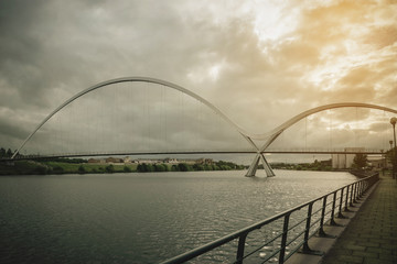 Fototapeta na wymiar Infinity Bridge on dark sky with cloud at Stockton-on-Tees, UK.