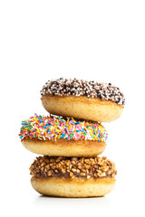 various donuts on white background