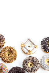 Fototapeta premium various donuts on white background
