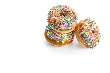 various donuts on white background