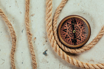 Compass on a gray gradient background