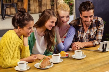 Smiling friends taking a selfie