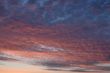 sunrise in the colored sky, soft clouds and abstract background