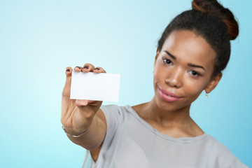 African american woman holding blank paper