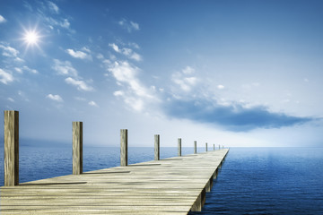 Fototapeta premium wooden jetty blue ocean