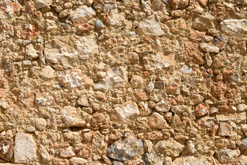 Old wall of limestone rocks.