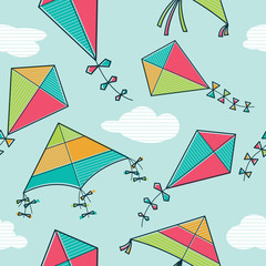 Vector kites flying in the sky seamless pattern