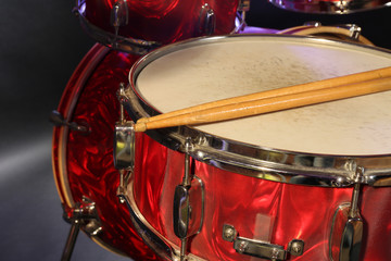 Drums set and sticks, close-up