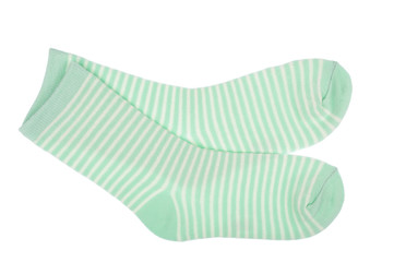 Green striped childish socks isolated.
