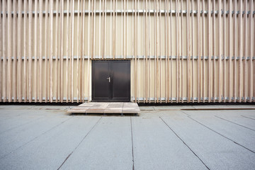 an wall of timber whit an door