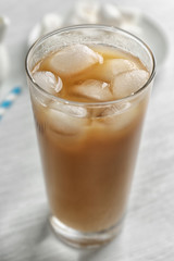 Cold coffee on wooden table