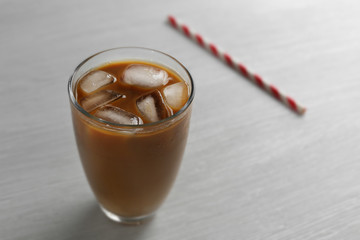 Cold coffee on wooden table