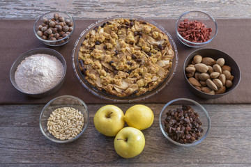 Cake and ingredients on table