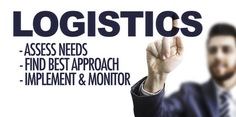 Business man pointing the text: Logistics