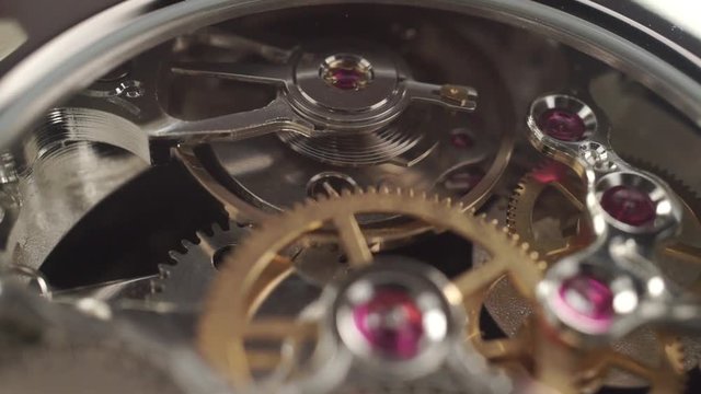 Swiss made wrist watch mechanism, macro dolly shot
