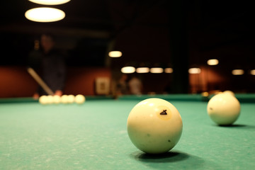 Billiard balls in a pool table