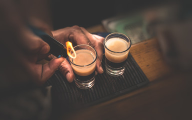 Two B 53 cocktails with lighter