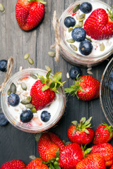 delicious dessert - yogurt with strawberries and blueberries