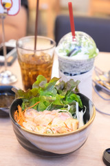 Japanese cuisine Salmon sushi don on fresh salad