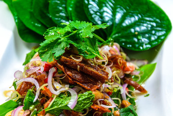 deep fired squid hot and spicy salad with chaplo leave