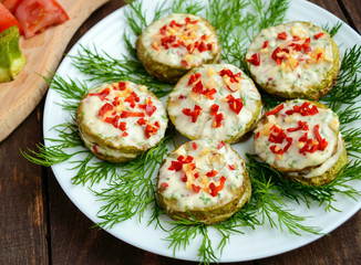 Spicy fried zucchini rings with mayonnaise, garlic, hot pepper and herbs. Close-up