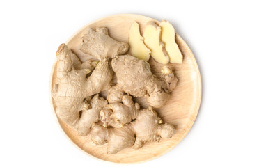 Ginger on wooden plate and white background
