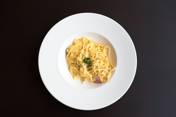Spaghetti Carbonara on white plate