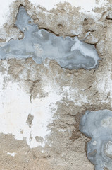 A broken cement wall