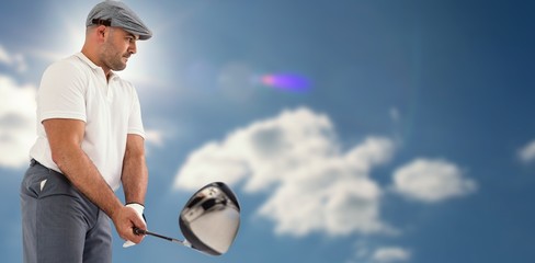 Composite image of golf player taking a shot © vectorfusionart